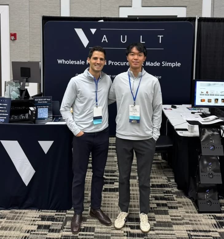 Vault co-founders Spencer Haik and George Miao at the Vault booth